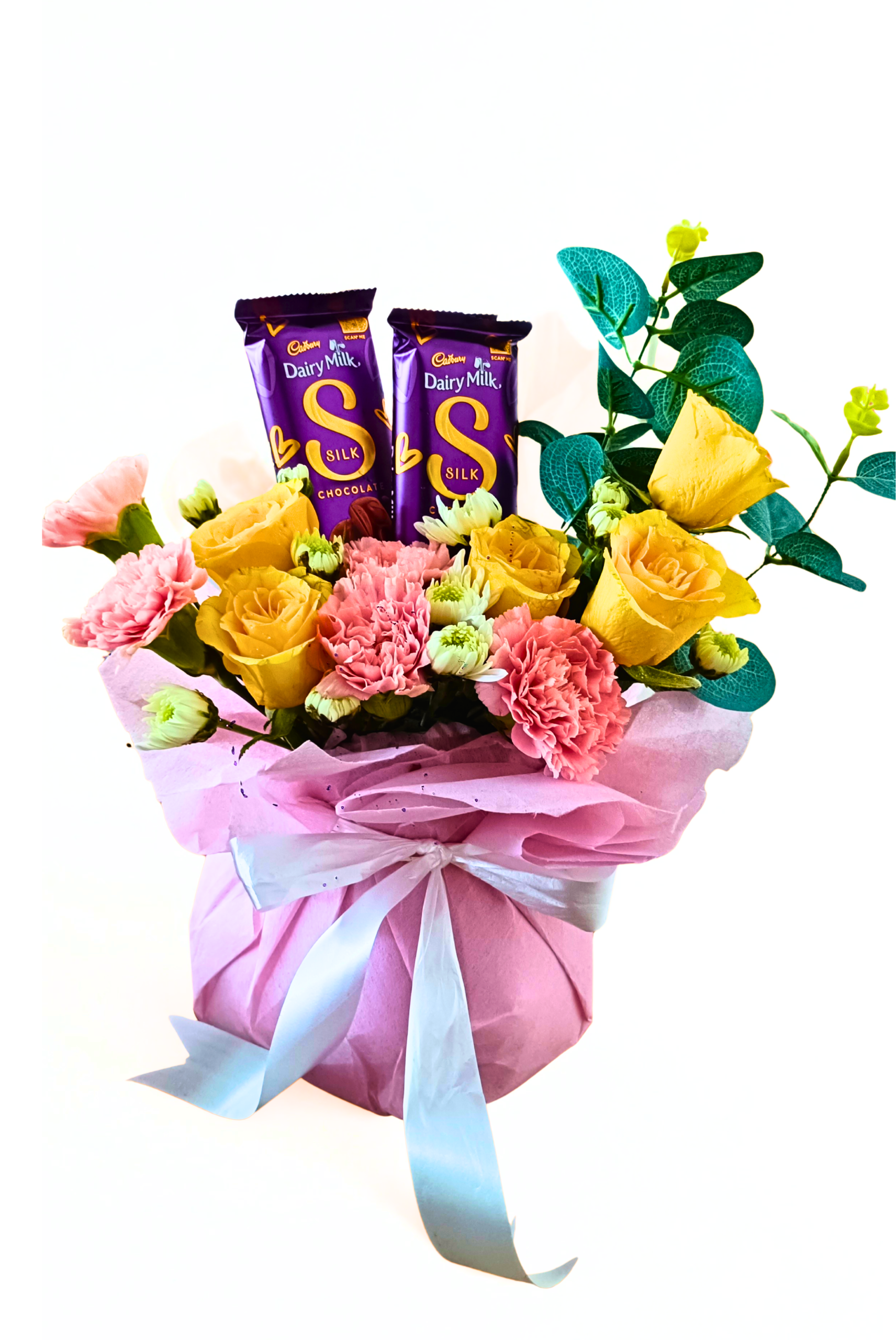 5 Yellow Roses, 5 Pink Carnations & Hybrid Flowers with 2 Dairy Milk Silk – Glass Vase Arrangement