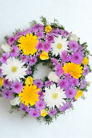 🤍💜💛 Purple, White & Yellow Flower Wreath – Elegant Funeral & Condolence Tribute